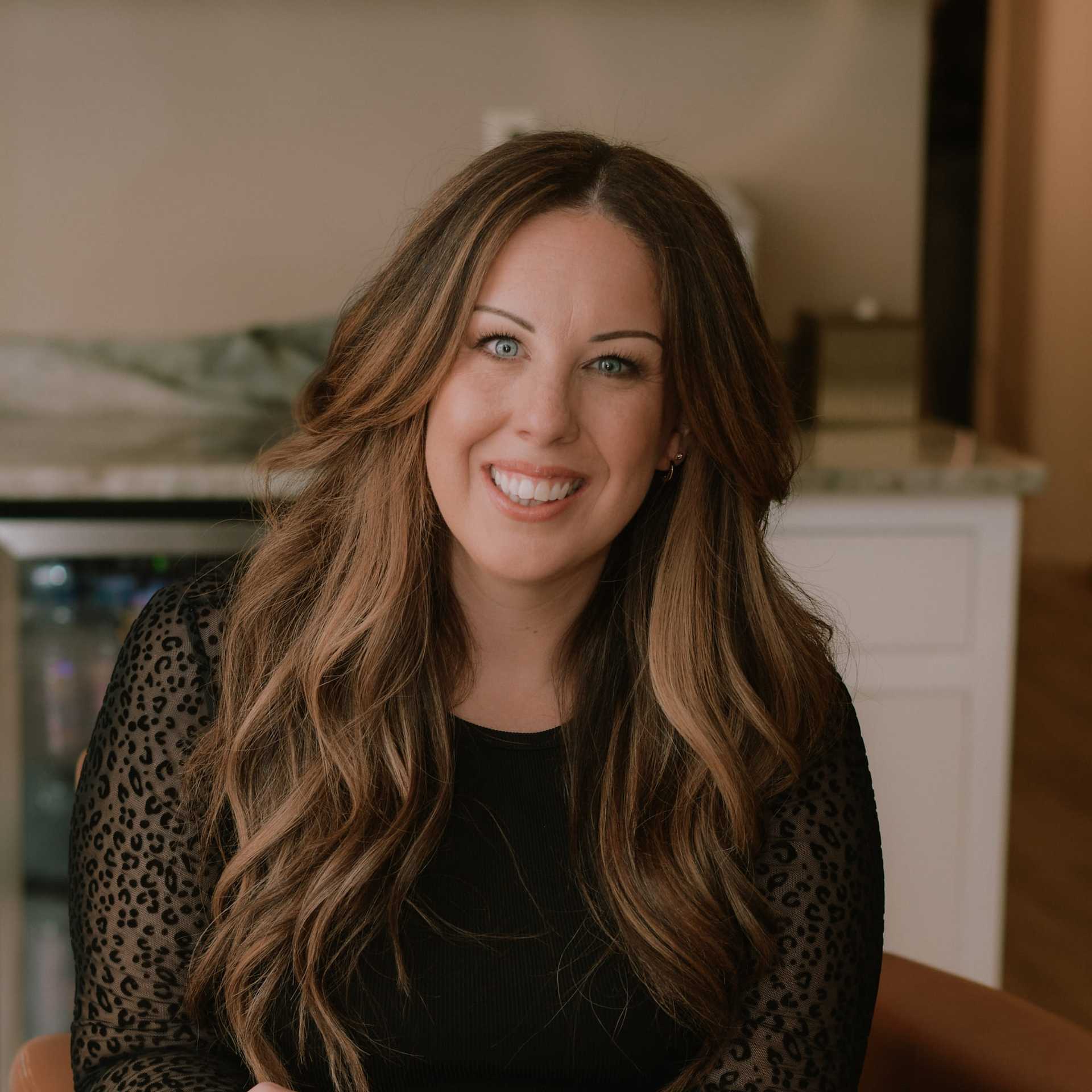 Portrait of Renee Doman, a professional stylist at Studio 1921, showcasing their expertise and style.