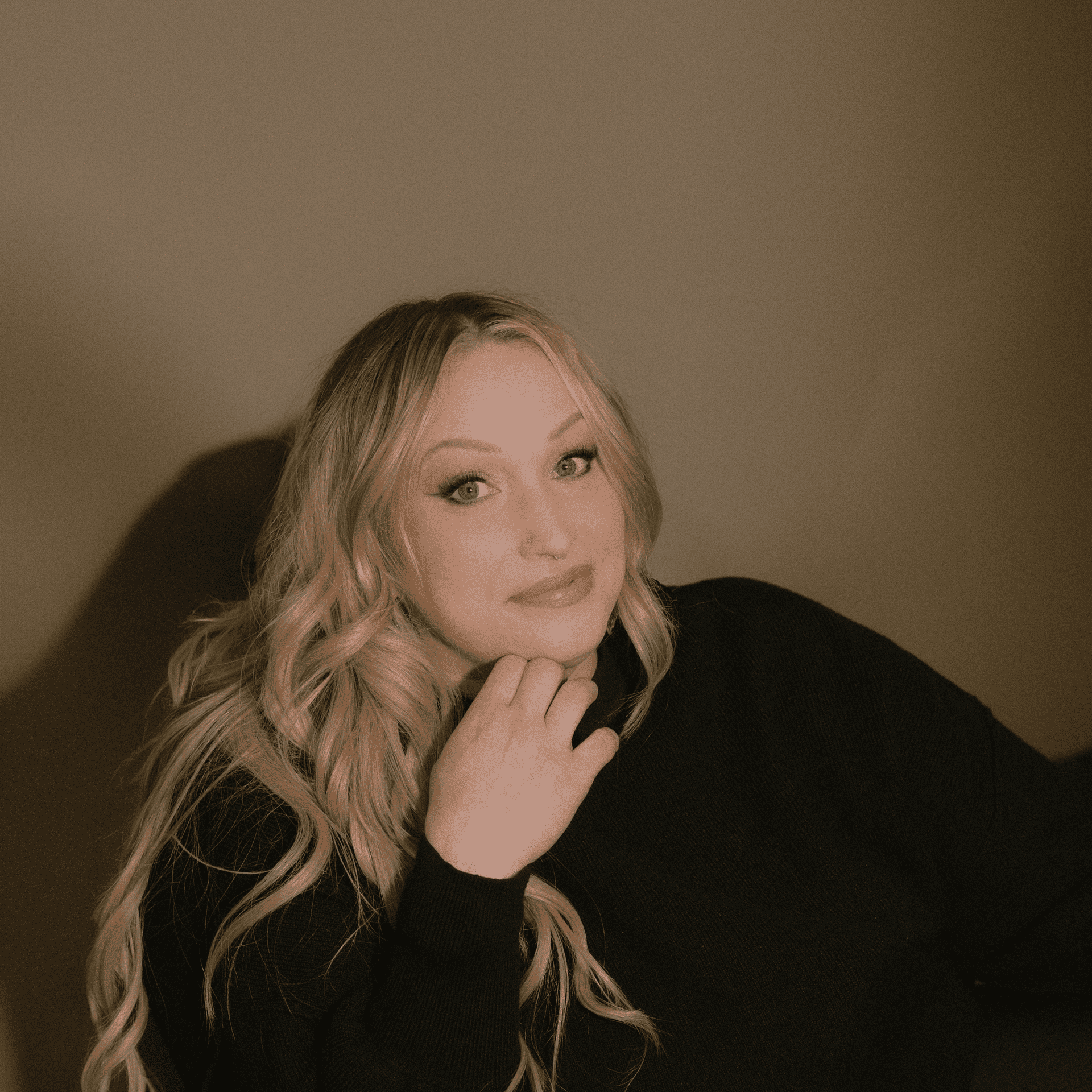 Portrait of Christina Fleischer, a professional stylist at Studio 1921, showcasing their expertise and style.